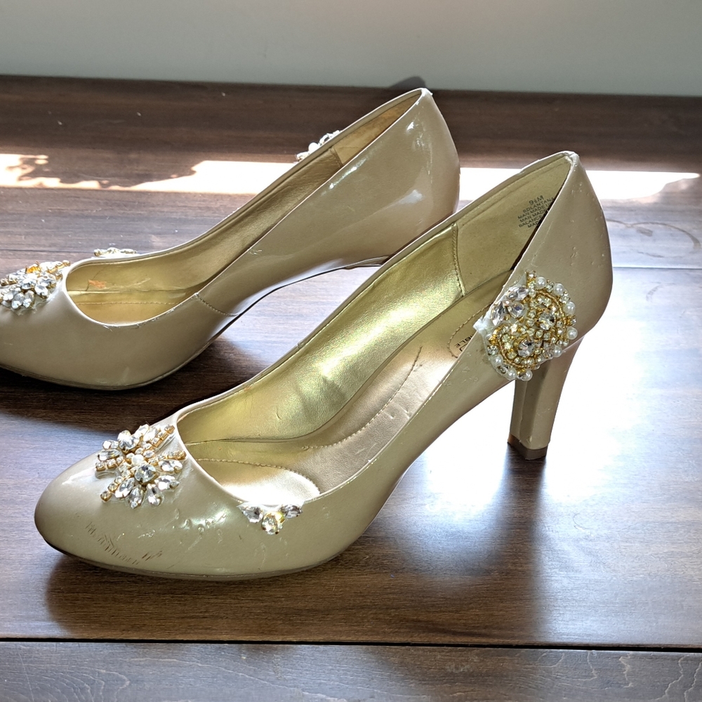 Women's size 9 pumps embellished with jewels.